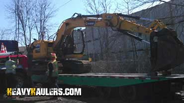 Crawler excavator transport.