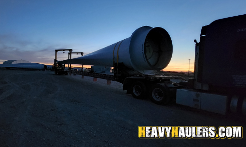 Wind turbine blade shipped on a specialty trailer.