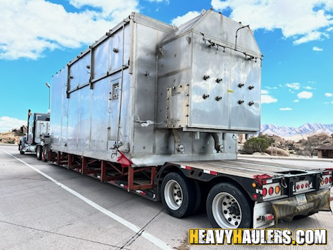 Shipping a spray dryer on a trailer.