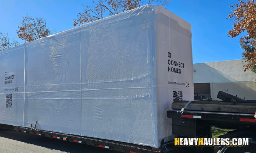 Loading a push barge with a travelift.