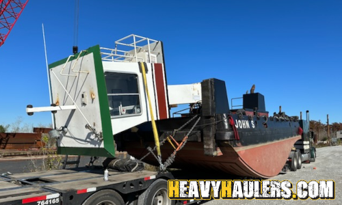 Transporting an oversize push barge.