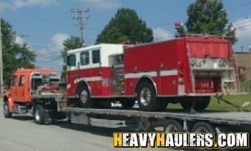 Hauling a GMC brigadier fire truck.