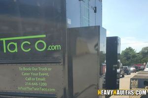 Loading a 2022 food truck on a trailer.