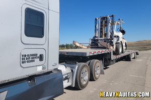 Hay bale loader transport.