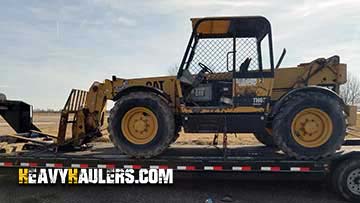 Shipping a forklift on a trailer.