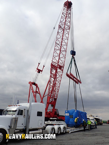 Unloading a freight off a low trailer