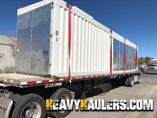 silver freight box being transported