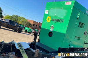 2013 DCA-45SS mobile generator loaded on a flatbed trailer.