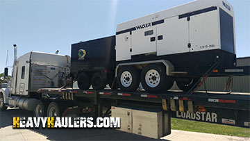 Transporting An Ingersol & Wacker Towable Generator on a Flatbed Trailer