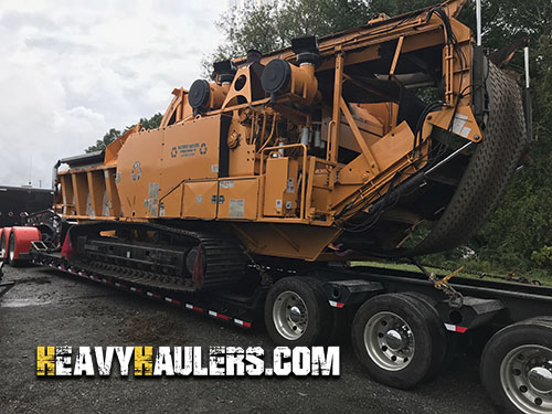 cbi 6800 woodgrinder being loaded and ready for heavy haul trucking