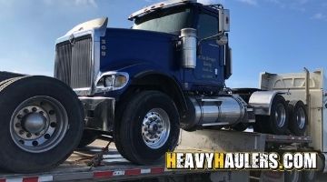 Hauling an International paystar daycab truck from North Dakota.