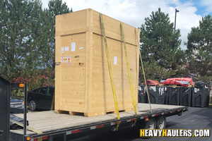 Hauling materials on a flatbed trailer.