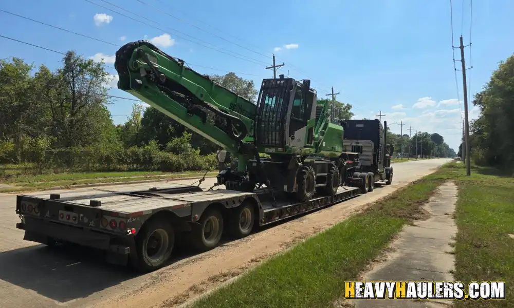 Hauling a Sennebogen 718 material handler