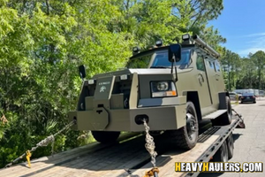 Transporting a 2003 Lenco BearCAT armored vehicle.