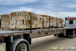 Palletized limestone haul.