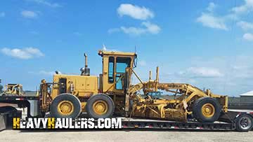 Shipping a 28,000lbs Caterpillar motor grader.