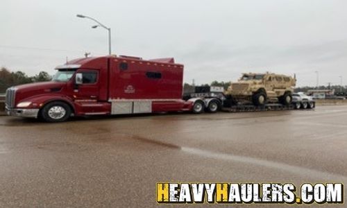 Hauling an armored truck.