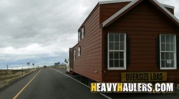 Shipping a tiny home on a trailer.