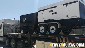 Generator shipped on a flatbed trailer.
