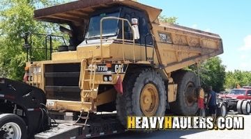 Shipping a Caterpillar 773D rock truck on an RGN trailer.