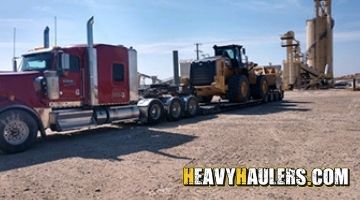 Shipping a wheel loader on an RGN trailer.