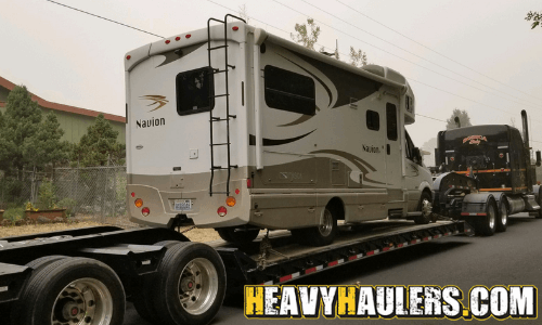 Shipping a Navion RV on a low boy trailer