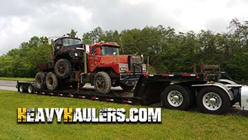 Welded Mack trucks transport.