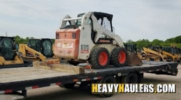 Hauling a Bobcat.