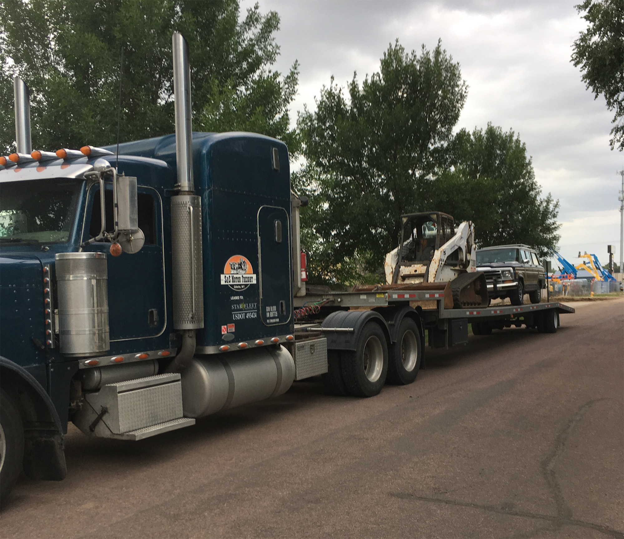 Skid Steer Transport Services | Heavy Haulers | (800) 908-6206