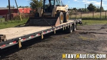 Hauling a skid steer from Seattle, WA.