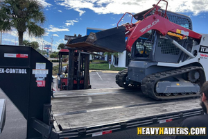 2022 takeuchi tl8 skid steer haul.