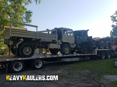 Stake Truck Being Transported