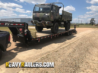 Military Stake Truck Being Shipped
