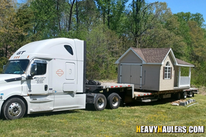 Tiny home loaded on a trailer.