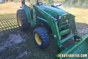 Transporting a John Deere 4510 tractor.