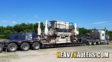 Transporting a Terex asphalt paver in Texas.