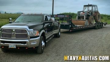 Transporting a tractor on a hot shot trailer.