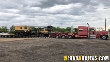 2000 American 5530 Truck crane transport.