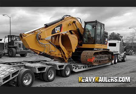 oversize excavator transport on an RGN