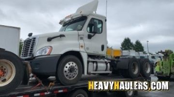 Transporting a Freightliner semi truck.