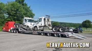 Shipping a Cascadia daycab on a trailer.