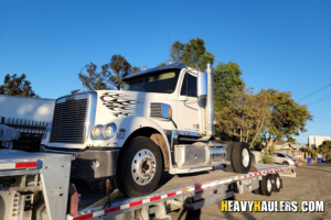 Transporting a Freightliner Single Axle Day Cabv.