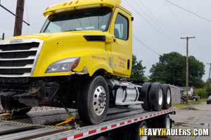 Freightliner tandem axle day cab haul.