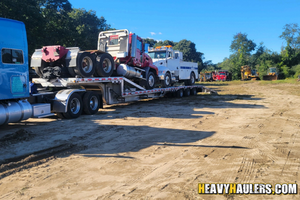 Shipping a Peterbilt 3337 mechanic truck and mack day cab.