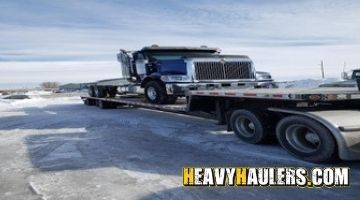 Transporting an International paystar daycab on a trailer from Idaho.