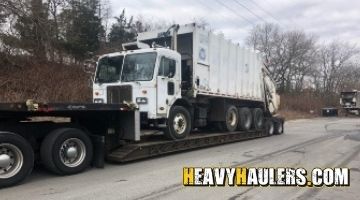 Hauling a Peterbilt garbage truck from Tennessee.