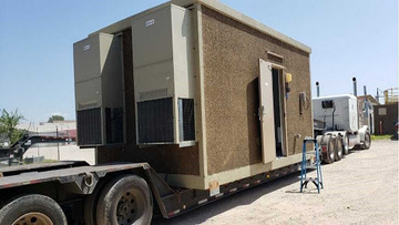Transporting a precast building in Texas.