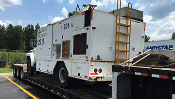 Hauling 1991 Ford F-700 Truck