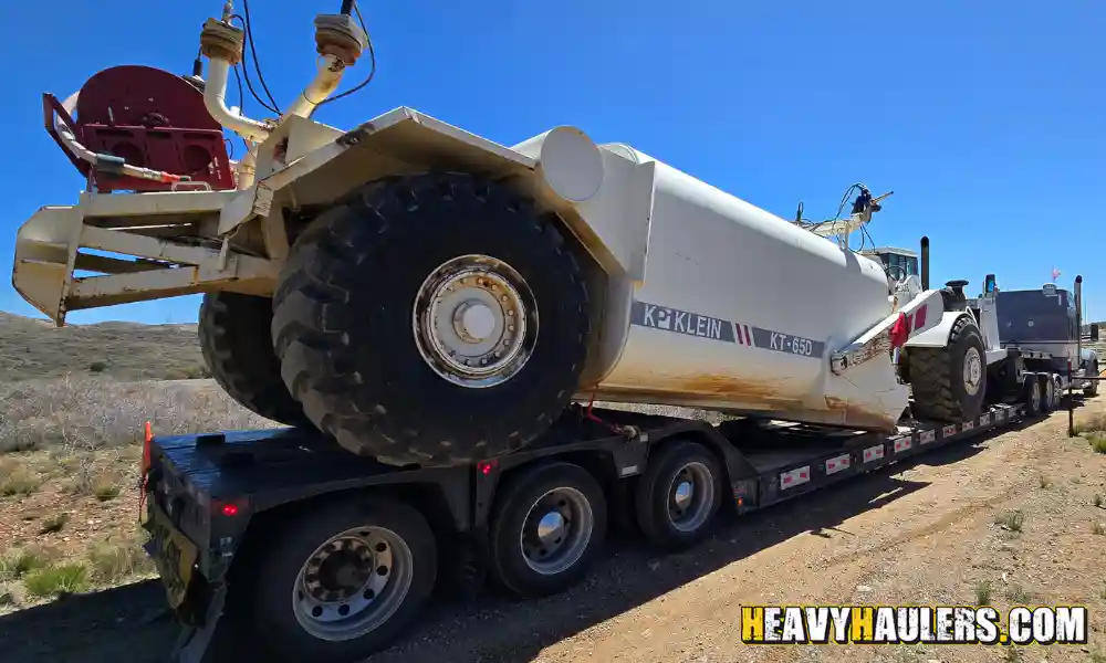 A 2006 terex S17WC Water Truck being transported