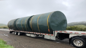 Water tanks being transported